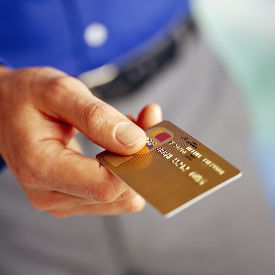 A person holding credit card