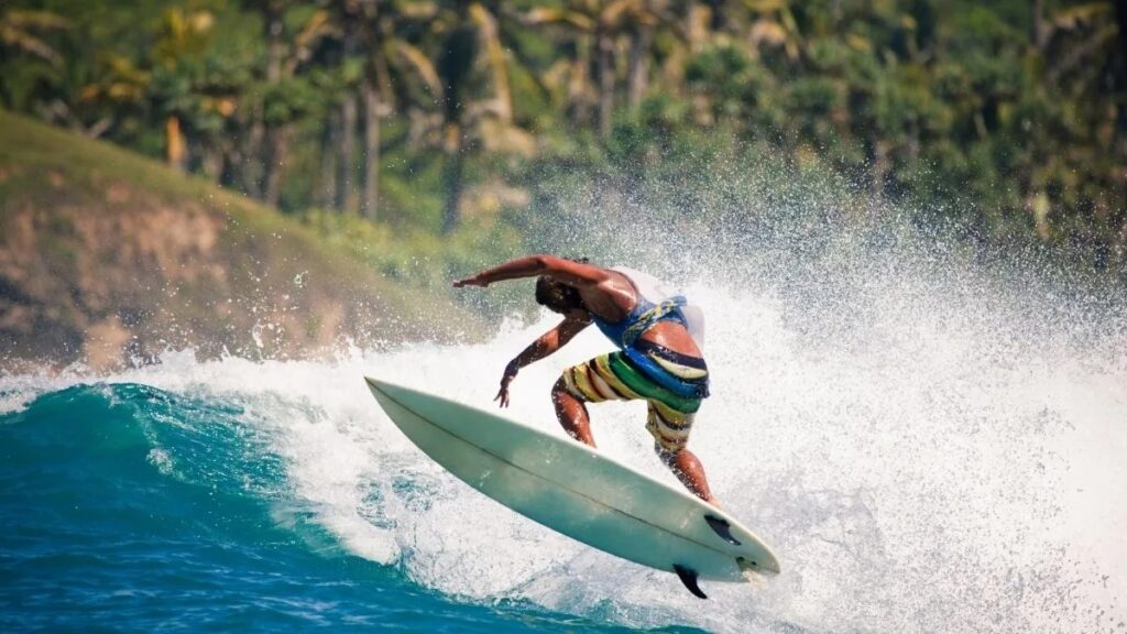 A man surfing at Cherai Beach